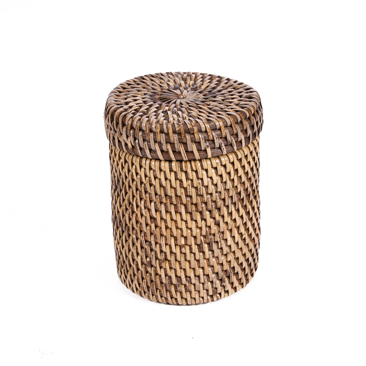 Woven rattan storage basket with lid on a white background