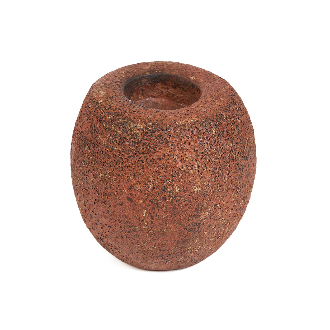 Rust-colored terracotta candle holder on a white background