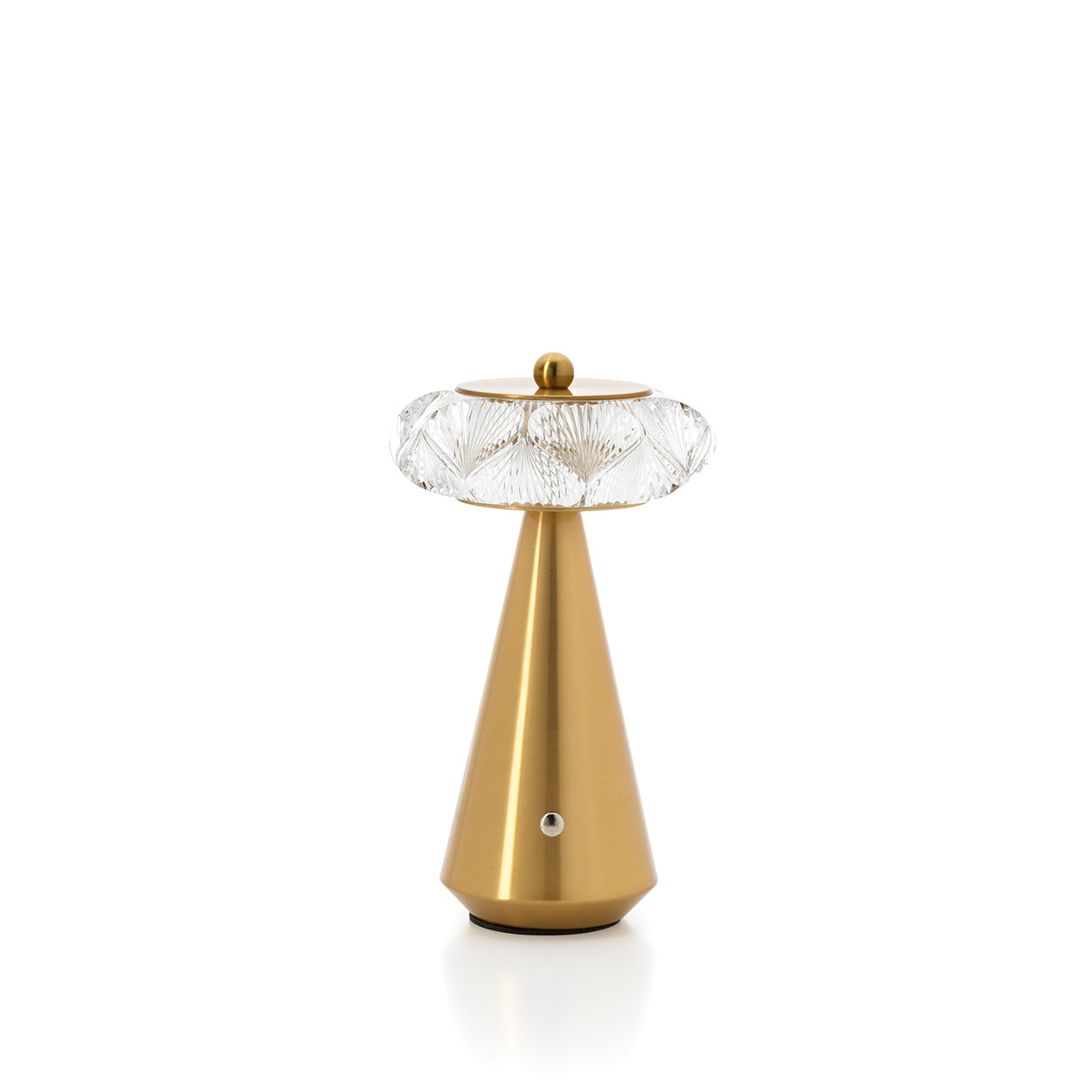 Gold table lamp with diamond shape glass on a white background