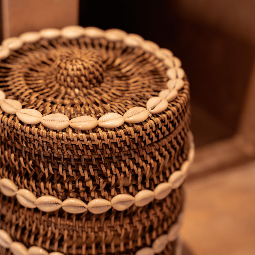 Woven rattan basket on a blurred background