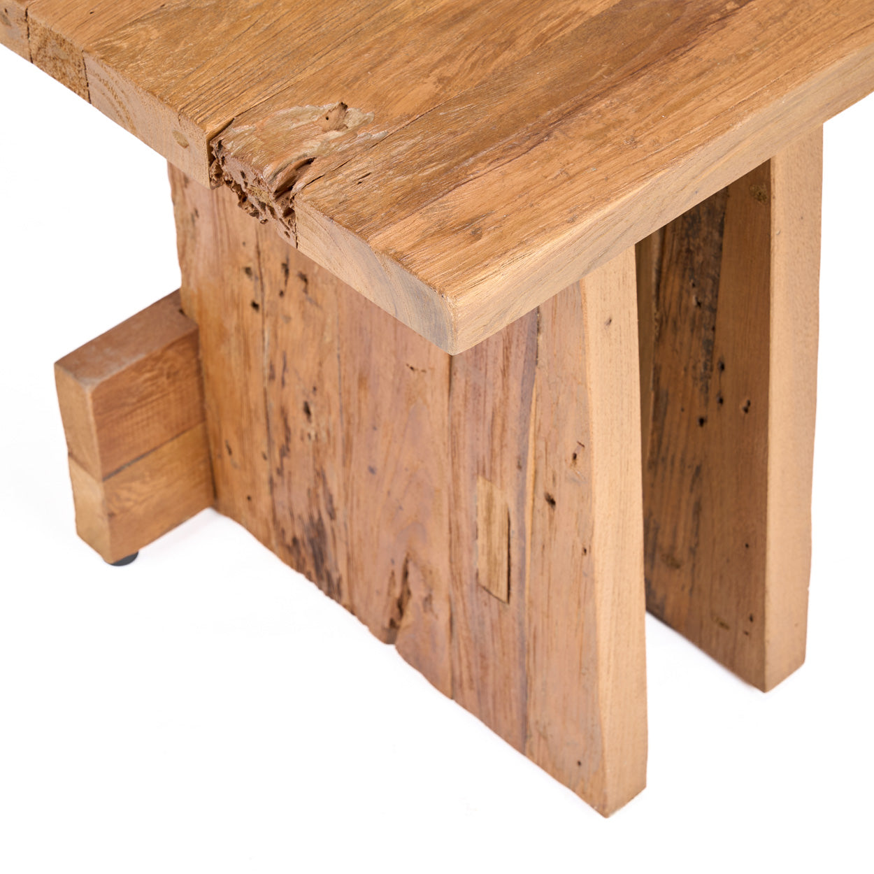 Close-up of a wooden stool with a rustic design on a white background