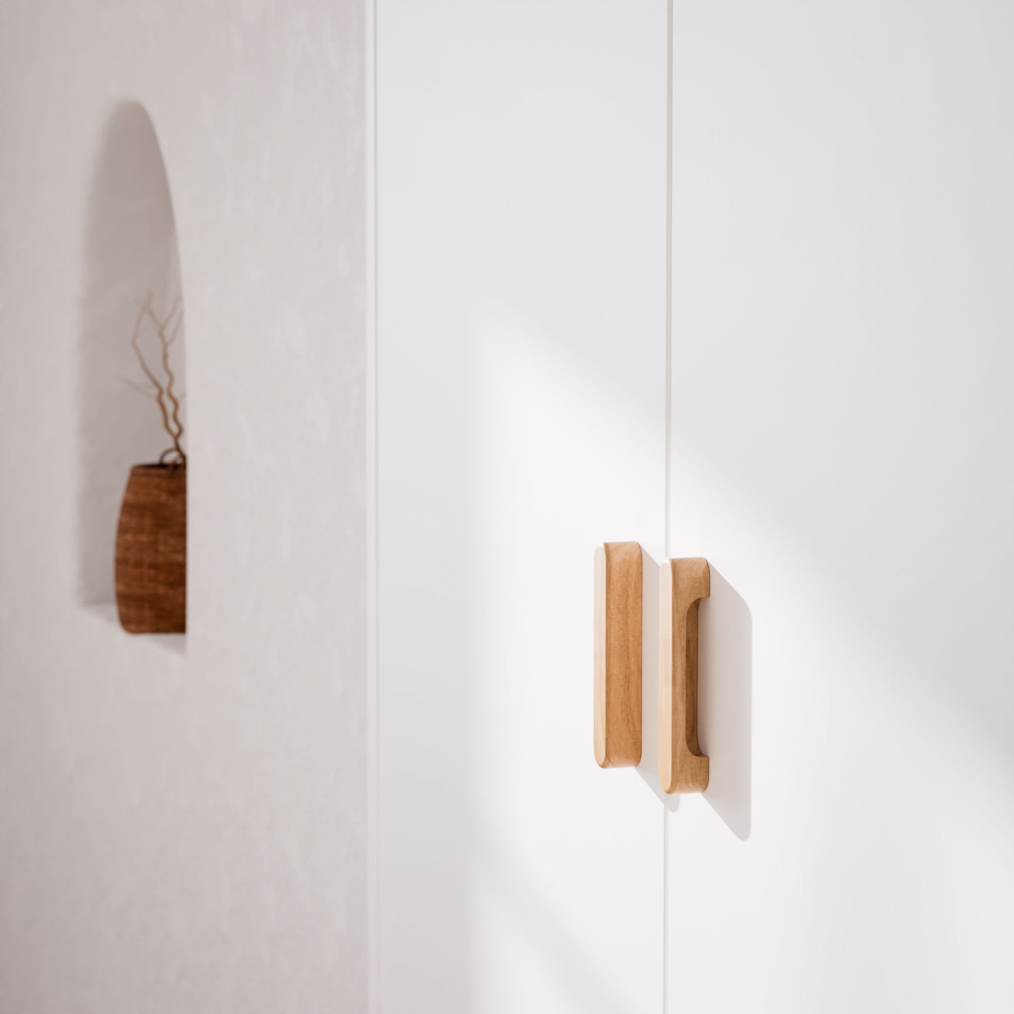 Close-up of a NEREE Wardrobe 2D with wooden handles