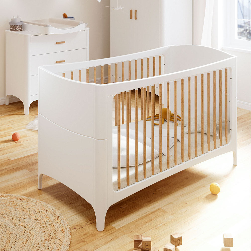 NEREE LIT Bed 70X140 - Neige with wooden slats on a wooden floor in a bright room.