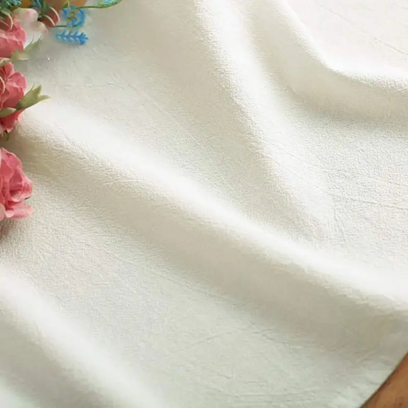 Weißer Tischläufer aus Baumwollstoff