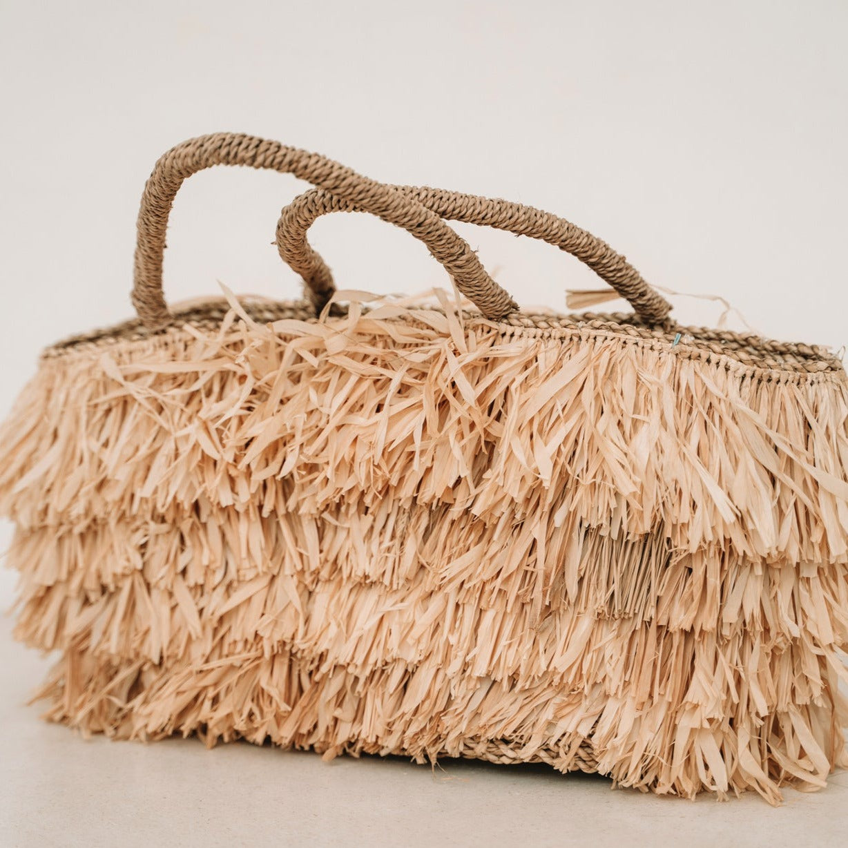 THE RAFFIA BAHAMAS Basket-Natural side view