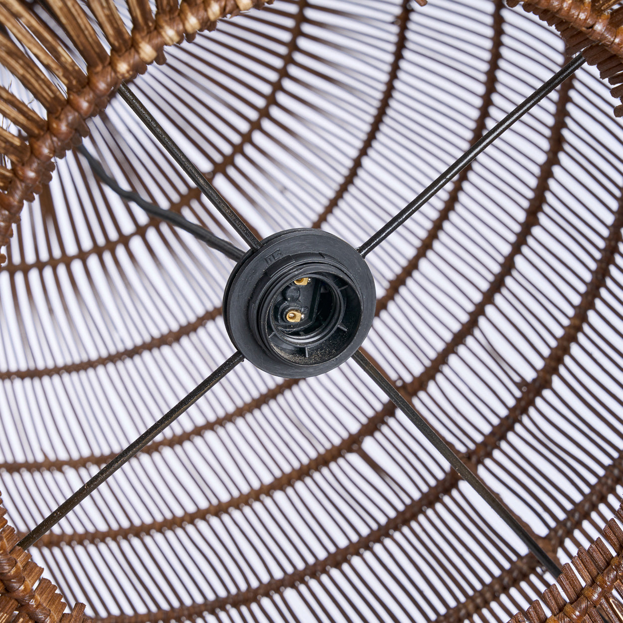 Close view of wicker pendant with on a white background