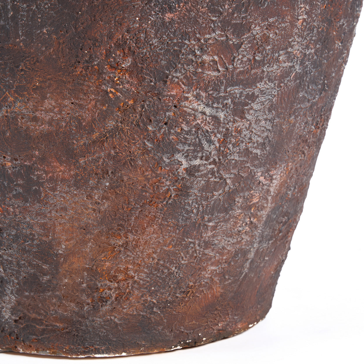 Close-up of a rusted brown vase