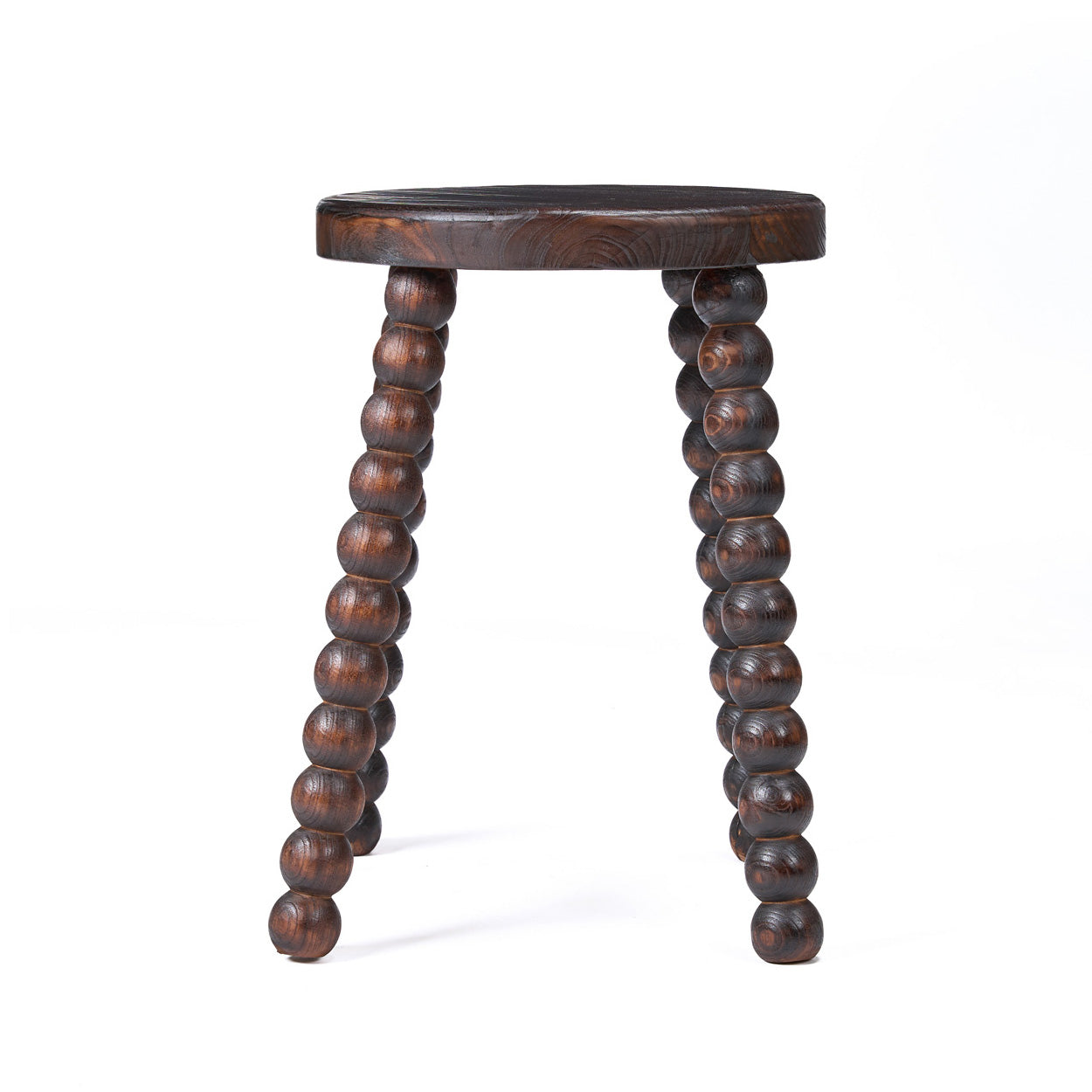 Side view of wooden stool with spiral legs on a white background