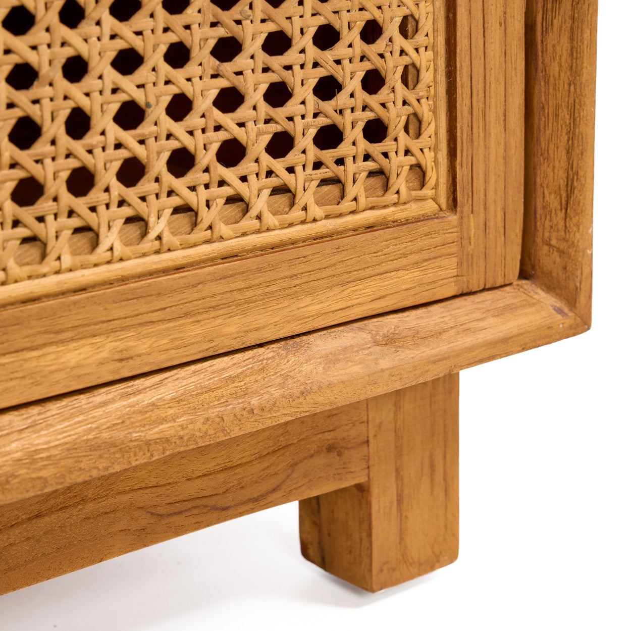 Close-up of a nightstand with a wicker texture on a white background