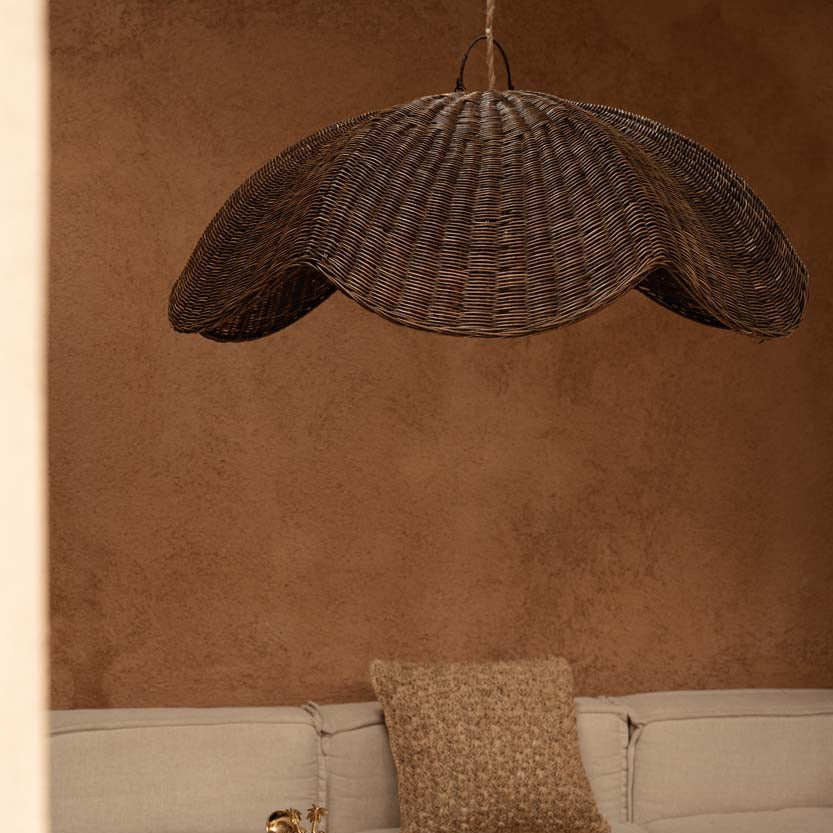 Living room with a the Wave Pendant - dark walnut beige sofa, and coffee table