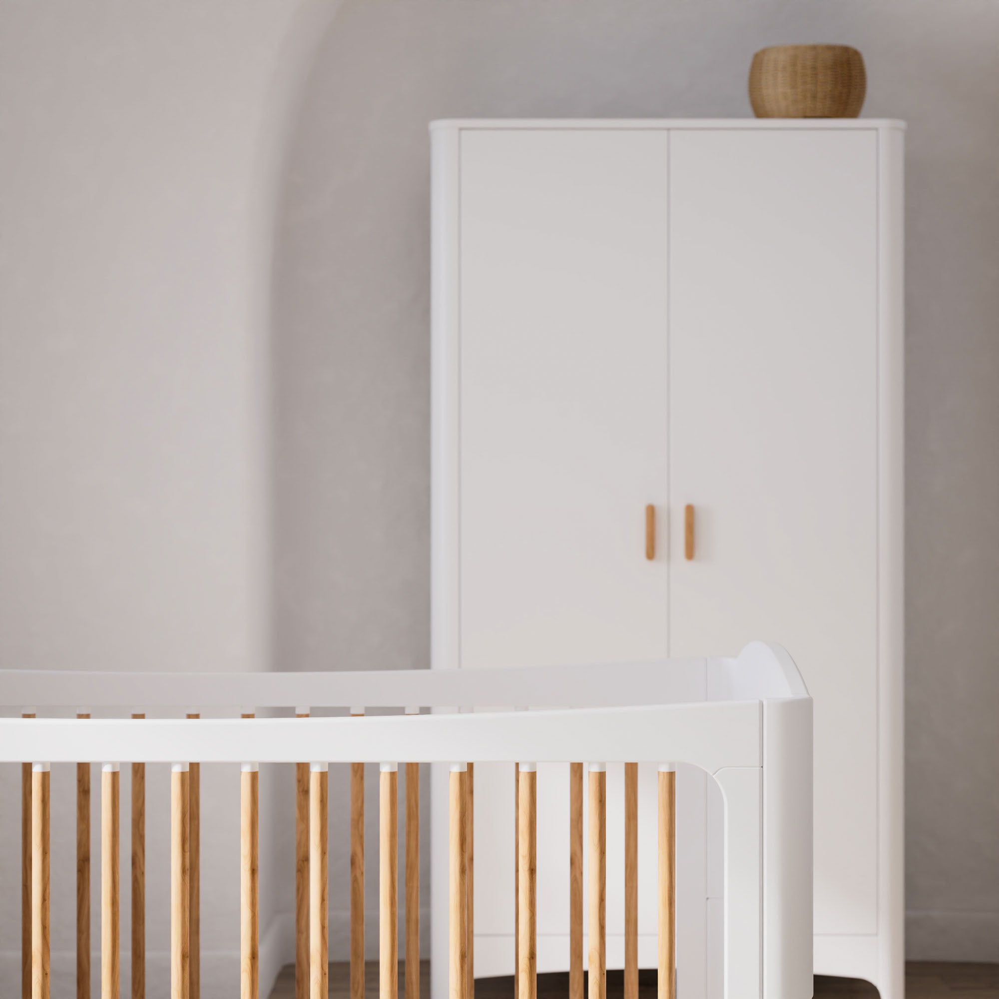 White crib with wooden bars and a matching NEREE Wardrobe 2D